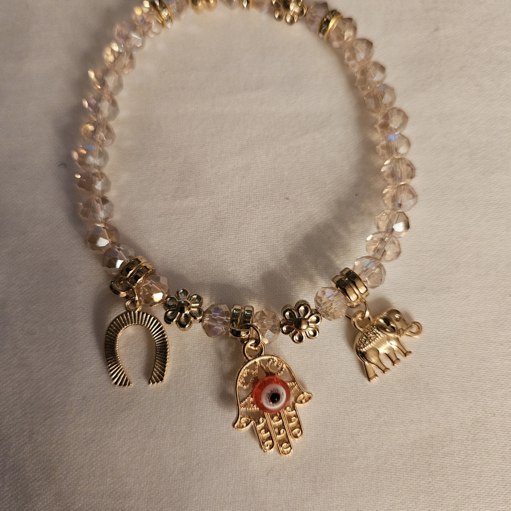 Elegant Gold and Crystal Charm Bracelet